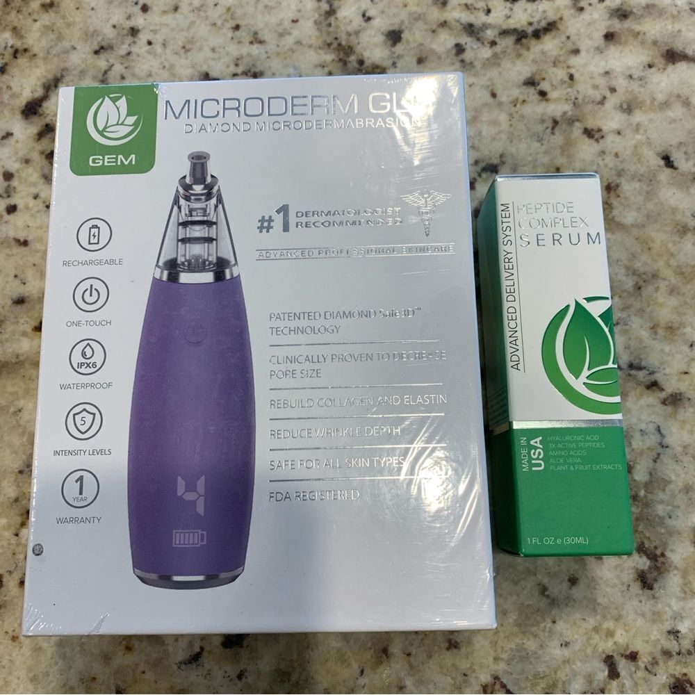 Microderm Glo Diamond Microdermabrasion and Suction Tool Purple & Peptide Serum